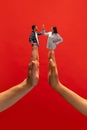 Creative collage with hands. Young man and woman giving high five with hands symbolizing support, partnership, agreement