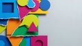 Bright torn paper collage with colorful geometric shapes and negative space on white background Royalty Free Stock Photo