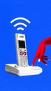 Creative collage. Retro cordless phone with red hand pressing button in photocopy style. Royalty Free Stock Photo