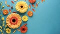 Creative composition of beautiful yellow and orange gerbera flowers with petals on blue background Royalty Free Stock Photo