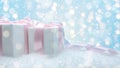 Creative composition with Christmas gift boxes on abstract bokeh background. Minimal Christmas or New Year concept Royalty Free Stock Photo