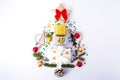 Creative composition of Christmas tree made of Christmas decorations on white background, flat lay, top view Royalty Free Stock Photo