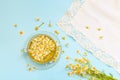 Creative composition made of a cup of camomile tea. Natural  drink for relaxation. Nature concept. Top view. Flat lay Royalty Free Stock Photo