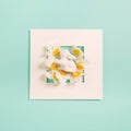 Creative composition made of easter bunny and flowers on pastel background with white frame. Minimal holiday concept Royalty Free Stock Photo