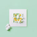 Creative composition made of easter bunny and daffodil flowers on pastel background with white frame. Minimal holiday concept. Top Royalty Free Stock Photo