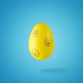 Creative composition made of yellow Easter egg. Minimal spring or summer Holiday concept. Fun background Royalty Free Stock Photo