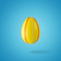 Creative composition made of yellow Easter egg. Minimal spring or summer Holiday concept. Fun background Royalty Free Stock Photo