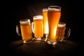 Creative concept. Beer glasses on wooden table at dark toned foggy background Royalty Free Stock Photo