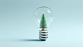 Creative Concept of Christmas Tree Inside Light Bulb Reflecting Holiday Innovation Trend.Christmas and New Year concept Royalty Free Stock Photo