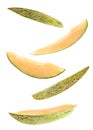 Set of five flying melon slices isolated on white background. cut melon fruit in pieces isolated on white background. Levity fruit Royalty Free Stock Photo
