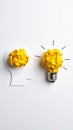 Creative concept of idea generation and problem solving with paper and lightbulb Royalty Free Stock Photo