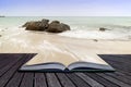 Creative concept pages of book Sennen Cove beach before sunset i