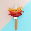 Creative Concept :peppers impaled on stainless kitchen knives o Royalty Free Stock Photo