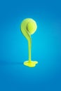 Creative concept photo of tennis ball melting