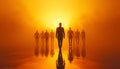 A creative concept of team leader standing among silhouettes of people, symbolizing leadership and unity Royalty Free Stock Photo