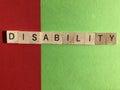 Creative Concept : the word Disability in wooden letters