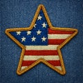 Threaded star of sesilience â Americana symbol on denim canvas Royalty Free Stock Photo