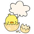 A creative cute cartoon chick hatching from egg and speech bubble in comic book style Royalty Free Stock Photo
