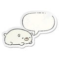 A creative cute cartoon polar bear and speech bubble distressed sticker Royalty Free Stock Photo