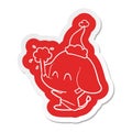 A creative cute cartoon sticker of a elephant spouting water wearing santa hat