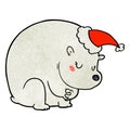 A creative cute textured cartoon of a polar bear wearing santa hat