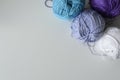 Creative decoration of colorful knitting wools for handmade on white table, with copy space. Royalty Free Stock Photo