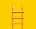 Creative design concept. Flat lay minimal style of staircase pencils on yellow background Royalty Free Stock Photo