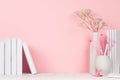 Creative designers workplace - light pink pastel interior with white office stationery.