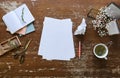 Creative desk pictures flowers cup of tea and sheets of paper