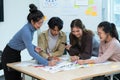 creative digital development agency brainstorming about mobile app interface wireframe design on desk at modern office Royalty Free Stock Photo