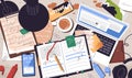 Creative disorder is in student workplace while learning process top view. Mess, cup, can are on dirty desk. Messy table