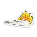 A creative distressed sticker of a cartoon burning paper airplane Royalty Free Stock Photo