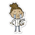 A creative distressed sticker of a cartoon crying saleswoman