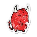 A creative distressed sticker of a cartoon halloween devil Royalty Free Stock Photo