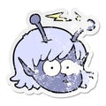 A creative distressed sticker of a cartoon telepathic alien space girl face Royalty Free Stock Photo