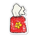 A creative distressed sticker of a cartoon tissue box Royalty Free Stock Photo