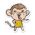 A creative distressed sticker of a crazy cartoon monkey in dress