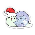 A creative distressed sticker of a cute cartoon christmas snail