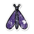 A creative distressed sticker of a cute cartoon moth bug