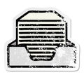 A creative distressed sticker of a cute cartoon stack of office papers Royalty Free Stock Photo