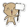 A creative distressed sticker of a happy cartoon bear with placard