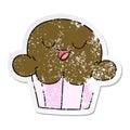A creative distressed sticker of a quirky hand drawn cartoon happy muffin