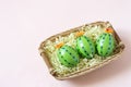 Creative Easter decor of cactus-shaped eggs in basket