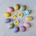 Creative Easter layout made of colorful eggs and flowers Royalty Free Stock Photo