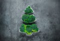 Creative edible Christmas tree made of fresh broccoli.Holiday ideas. New year food background top view