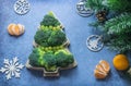 Creative edible Christmas tree made of fresh broccoli.Holiday ideas. New year food background top view . holiday, celebration, Royalty Free Stock Photo