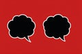 Double black dialogue bubbles on red background,Generative AI Royalty Free Stock Photo