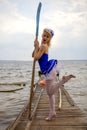 Creative Fine Art Portrait Of A Young Beautiful Woman On A Boat Royalty Free Stock Photo