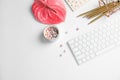 Creative flat lay composition with tropical flower, stationery and computer keyboard Royalty Free Stock Photo