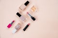 Creative flat lay of fashion bright nail polishes and decorative cosmetic on a colorful background. Minimal style. Copy Royalty Free Stock Photo